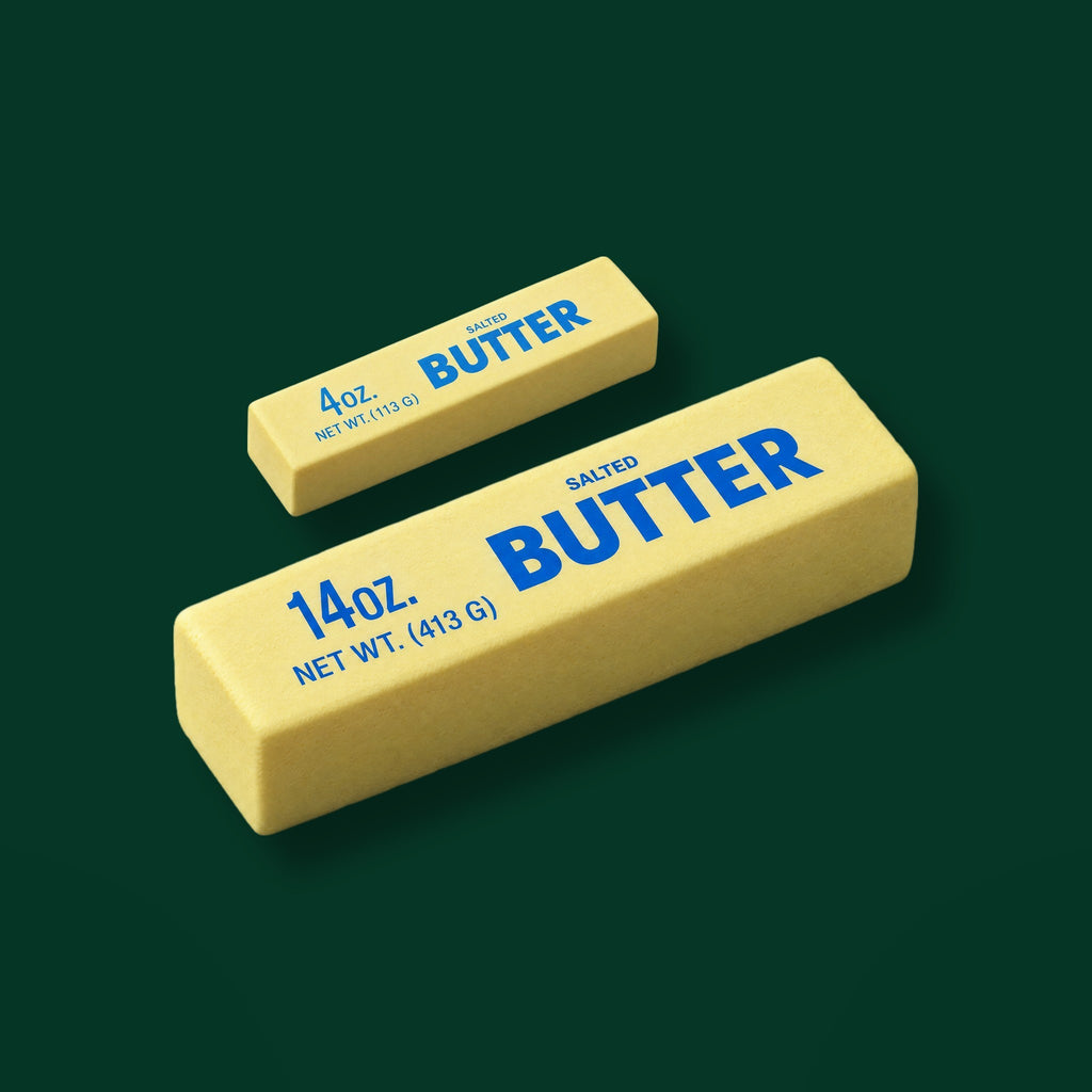 The Jumbo Butter next to The Butter Stick at true scale: about 24 cm long against about 13 cm